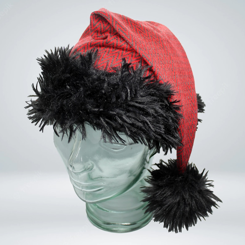 Red patterned fabric and black Santa hat